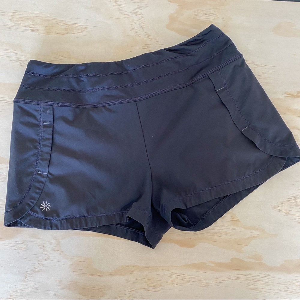 Black Athleta running shorts in size medium